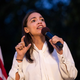 Illustration for article titled Alexandria Ocasio-Cortez Calls Out Mitch McConnell After 'Team Mitch' Thugs Groped and Choked an AOC Cutout